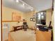 Inviting home office space with natural light, neutral tones, decor, and modern track lighting at 23485 Bluestem Dr, Golden, CO 80401