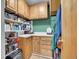 Well-stocked pantry with custom shelving and plenty of storage at 23485 Bluestem Dr, Golden, CO 80401