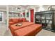 Spacious basement featuring a comfortable seating area, movie screen, and stylish decor for relaxation at 1762 Granger Cir, Castle Rock, CO 80109
