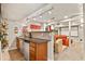 Finished basement featuring a wet bar, projector screen, and comfortable seating for entertainment at 1762 Granger Cir, Castle Rock, CO 80109