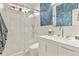 Contemporary bathroom featuring a glass-enclosed shower, marble countertop, and modern fixtures at 1762 Granger Cir, Castle Rock, CO 80109