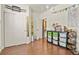 Cozy bedroom showcasing a built-in closet, playful decor, and ample space for storage and creativity at 1762 Granger Cir, Castle Rock, CO 80109