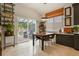 Bright breakfast nook with sliding glass doors leading to the outdoor dining area at 1762 Granger Cir, Castle Rock, CO 80109
