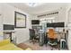 Functional home office with multiple monitors, natural light, and comfortable seating for remote work at 1762 Granger Cir, Castle Rock, CO 80109