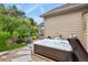 Relaxing backyard hot tub with stone landscaping, providing a private outdoor retreat at 1762 Granger Cir, Castle Rock, CO 80109