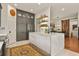 Contemporary kitchen featuring a large island, stainless steel appliances, and stylish gray cabinets at 1762 Granger Cir, Castle Rock, CO 80109