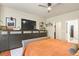 Spacious main bedroom with a large dresser and access to the ensuite bathroom at 1762 Granger Cir, Castle Rock, CO 80109