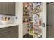 Well-organized walk-in pantry with shelving and storage solutions to maximize space at 1762 Granger Cir, Castle Rock, CO 80109
