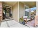 Cozy front porch with comfortable seating and decorative plants, perfect for relaxing outdoors at 1762 Granger Cir, Castle Rock, CO 80109