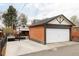 Garage with a basketball hoop and space to park your vehicle or for additional storage at 680 S Ogden St, Denver, CO 80209