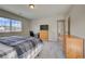 Bedroom with ample natural light, a desk, and views of the surrounding neighborhood at 4864 Harness Ct, Parker, CO 80134