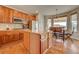 Updated kitchen boasts stainless steel appliances, and eat in breakfast nook at 4864 Harness Ct, Parker, CO 80134