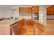 Updated kitchen features stainless appliances and granite countertops at 4864 Harness Ct, Parker, CO 80134