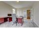 A spacious office with lots of storage and room for multiple desks and chairs at 4864 Harness Ct, Parker, CO 80134