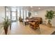 Inviting lobby with comfortable seating, plants, tile flooring, and ample natural light at 2500 S York St # 204, Denver, CO 80210