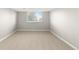 Neutral bedroom with large window and carpeted floor, perfect for a calming and versatile space at 34427 Columbine W Trl, Elizabeth, CO 80107