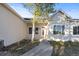 Well-maintained home featuring a concrete walkway leading to a white front door with an oval glass window at 34427 Columbine W Trl, Elizabeth, CO 80107