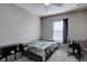 Comfortable bedroom with natural light and a dedicated study area at 5683 Raleigh Cir, Castle Rock, CO 80104