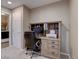 Functional home office space with custom built-ins and adjacent laundry room at 5683 Raleigh Cir, Castle Rock, CO 80104