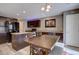 Well-equipped kitchen featuring stainless steel appliances and an adjacent dining table with bench seating at 5683 Raleigh Cir, Castle Rock, CO 80104
