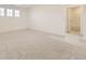 Bedroom includes plush carpet, 3 windows and ensuite bath at 10727 Snowdon St, Parker, CO 80134