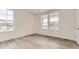 Bedroom features durable floors and large windows at 10727 Snowdon St, Parker, CO 80134