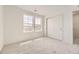 Bright bedroom features plush carpet, two windows and a closet at 10727 Snowdon St, Parker, CO 80134