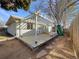 Outdoor patio area perfect for entertaining with a wooden pergola and a slide at 927 E 7Th Ave, Broomfield, CO 80020