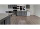 Modern kitchen features sleek appliances, granite counters, and ample cabinet space at 927 E 7Th Ave, Broomfield, CO 80020