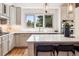 Bright kitchen featuring stainless steel appliances, white countertops and a view at 1570 Blakcomb Ct, Evergreen, CO 80439