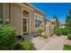 Charming home with a well-kept front yard, landscaped entrance, and a welcoming walkway at 9522 Silver Spur Ln, Highlands Ranch, CO 80130