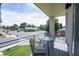 Inviting balcony with outdoor seating, offering views of the neighborhood and clear sky at 2197 S Clermont St, Denver, CO 80222