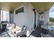 Outdoor balcony features comfortable seating, grill, and access to a bright and airy interior at 2197 S Clermont St, Denver, CO 80222