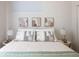 This well-lit bedroom features soft textures, complemented by neutral tones and modern lamps at 2197 S Clermont St, Denver, CO 80222