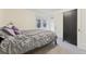Guest bedroom with a double bed and ample closet space at 1650 Monaco St Pkwy, Denver, CO 80220