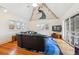 Bright bedroom with hardwood floors, a ceiling fan, and an artsy peacock graphic at 1650 Monaco St Pkwy, Denver, CO 80220