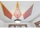 Decorative ceiling with geometric pattern at 1650 Monaco St Pkwy, Denver, CO 80220