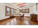 Wood floors, wood table and chairs, decorative ceiling at 1650 Monaco St Pkwy, Denver, CO 80220