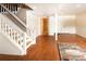 Spacious finished basement with hardwood flooring, white trim, and natural light at 6468 S Hudson St, Centennial, CO 80121