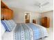 Comfortable bedroom features great lighting and an ensuite bathroom at 6468 S Hudson St, Centennial, CO 80121