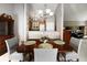 Inviting dining room offering sightlines to kitchen and living room; ideal for entertaining at 6468 S Hudson St, Centennial, CO 80121