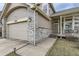 Beautiful home featuring a cozy front porch, two car garage, and well maintained landscaping at 21562 Omaha Ave, Parker, CO 80138