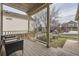 Inviting front porch provides outdoor seating, and a peaceful view of the neighborhood at 21562 Omaha Ave, Parker, CO 80138