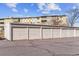 Detached individual garages for resident parking in front of apartment complex at 9155 E Center Ave # 3C, Denver, CO 80247