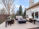 Large deck with fire pit and seating at 62 N Ranch Rd, Littleton, CO 80127
