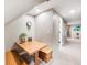 Basement dining area with a built-in table and bench seating in a finished basement at 62 N Ranch Rd, Littleton, CO 80127