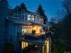 Exterior view of the backyard and deck with seating under a covered patio at twilight at 62 N Ranch Rd, Littleton, CO 80127