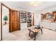 Bright walk-in closet with custom shoe rack, drawers and shelves at 62 N Ranch Rd, Littleton, CO 80127