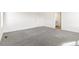 Spacious bedroom with neutral carpet and plenty of natural light at 9293 Biscay St, Commerce City, CO 80022
