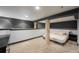 Bedroom with modern decor with gray accent wall, bright lighting and neutral decor at 915 N Kearney St, Denver, CO 80220